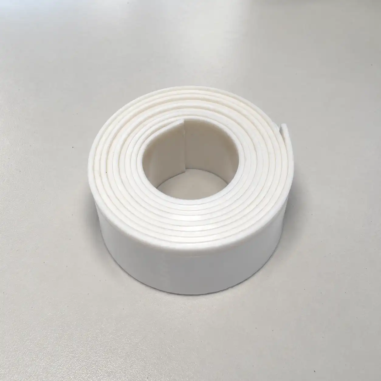 Opgerolde flexibele Teflon strook van wit PTFE